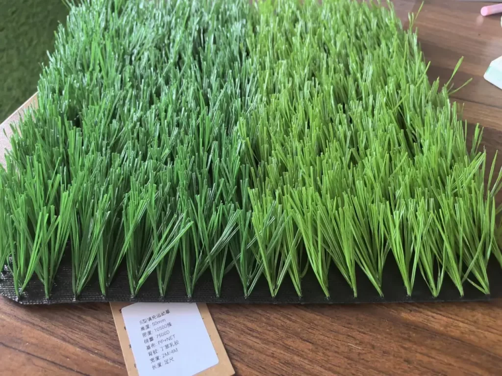 Artificial grass vs natural grass side-by-side comparison in a backyard garden, pros and cons of turf vs real grass